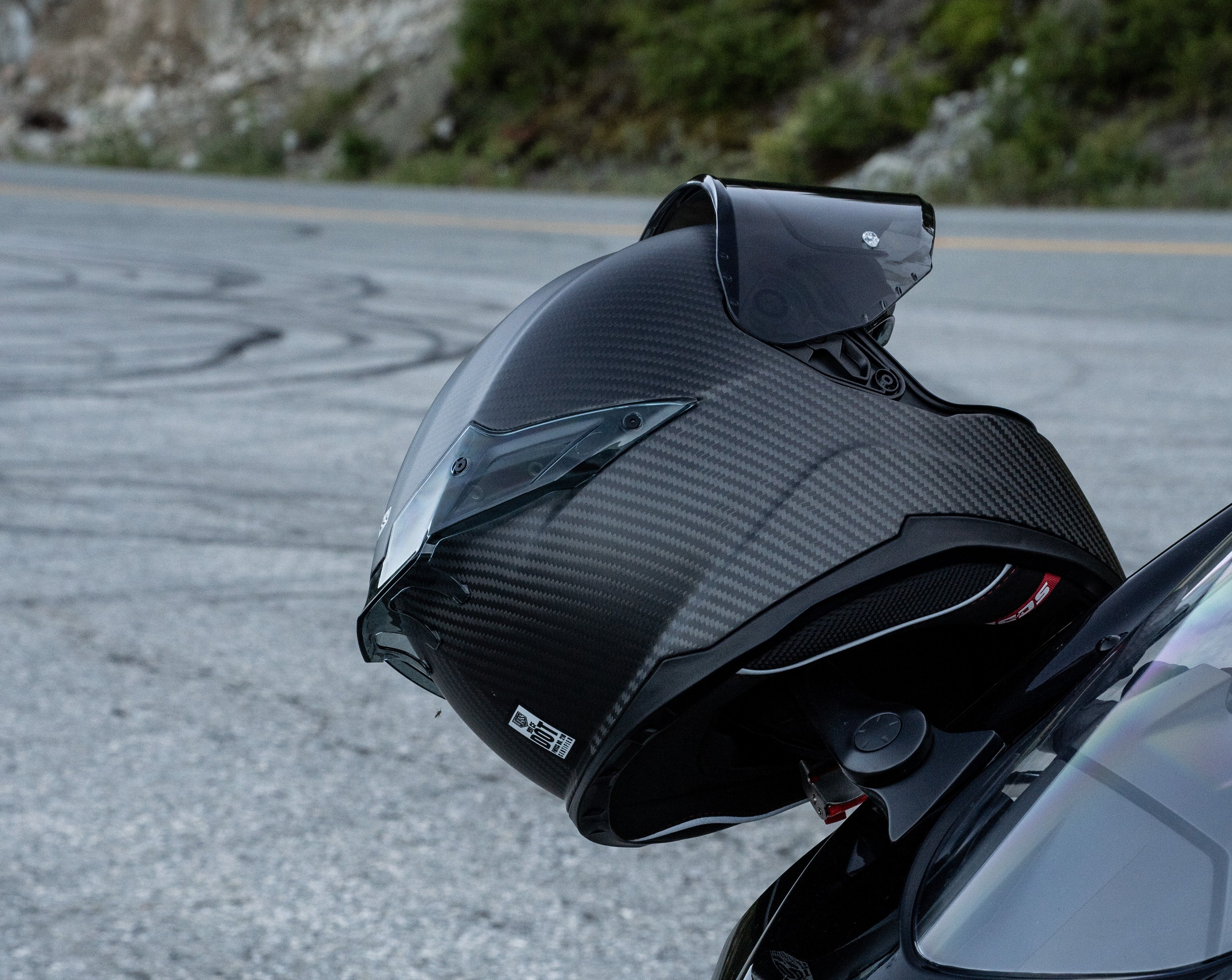 The Marvel of Carbon Fibre: Revolutionizing Motorcycle Helmets in Motorsports